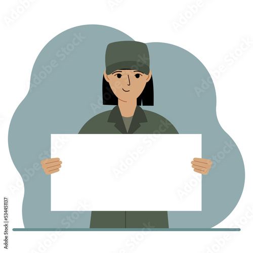 A military man in uniform holds a white sheet of paper in his hands. Concept for advertising, poster, banner.