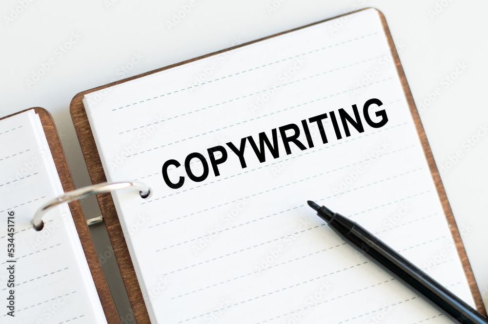 Business concept. Text Copywriting on a notepad on a bright table Business concept. Text Copywriting on a notepad on a bright table