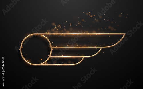 Golden circle frame with wing on black background
