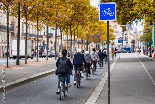 Cyclists on the bike path along the Seine in Paris. France