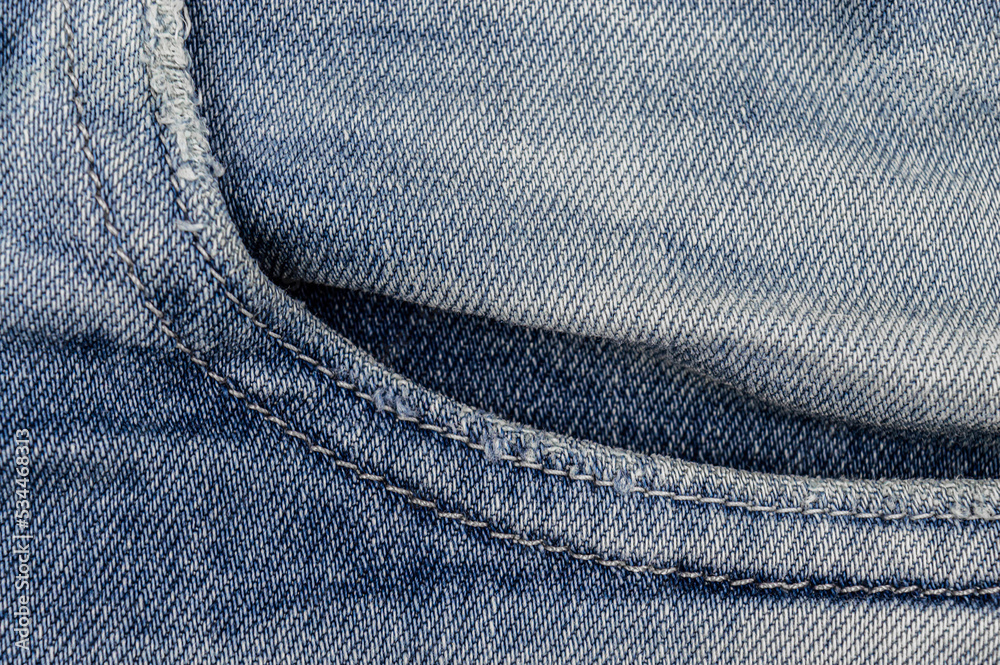 Front crumpled threadbare pocket oа blue jeans with white stithes Stock  Photo | Adobe Stock
