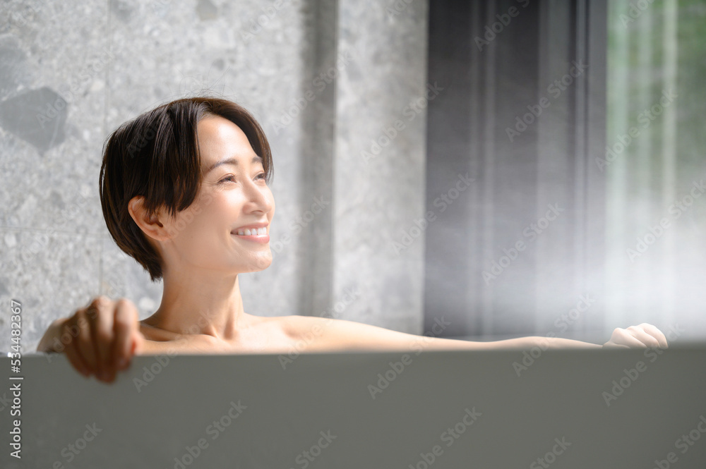 Woman relaxing in the bath tub Woman relaxing in the bath tub