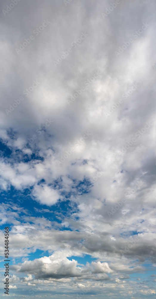 Obraz premium Fantastic clouds against blue sky, panorama
