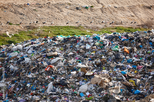 Open air garbage dump. Plastic waste pollution. Global warming. Consumerism