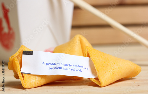 Fortune Cookie With Message. A problem Clearly Stated is a Problem Half Solved