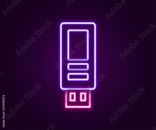 Glowing neon line USB flash drive icon isolated on black background. Colorful outline concept. Vector