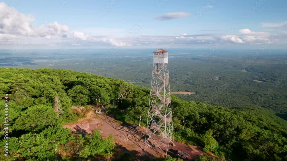 Panoramic mountaintop view of the Catskill Mountains with classic Fire Tower Panoramic mountaintop view of the Catskill Mountains with classic Fire Tower