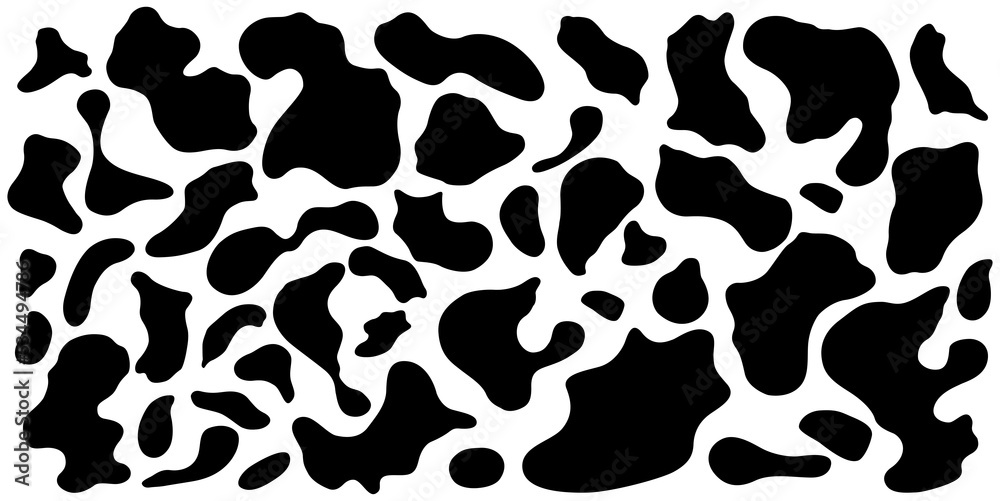 Black and white cow spots.Cow print elements set. Animal design print elements. Black and white cow spots.Cow print elements set. Animal design print elements.