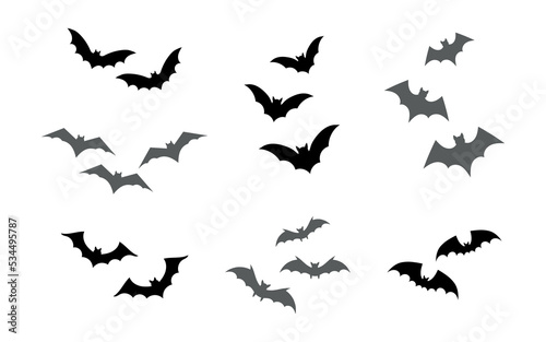 Set flying bats silhouette, isolated on white background. Vector illustration, traditional Halloween decorative elements. Halloween silhouette cute bats - for scary design and decor.