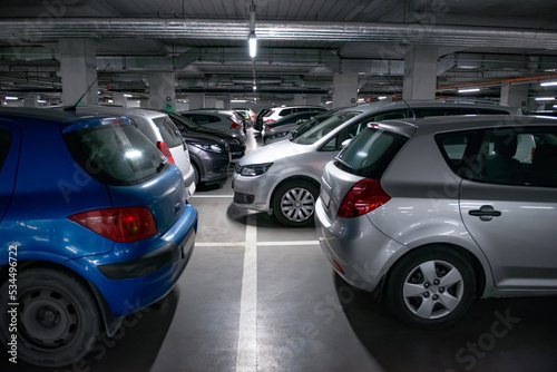 Fototapeta Naklejka Na Ścianę i Meble -  View of different cars in underground parking
