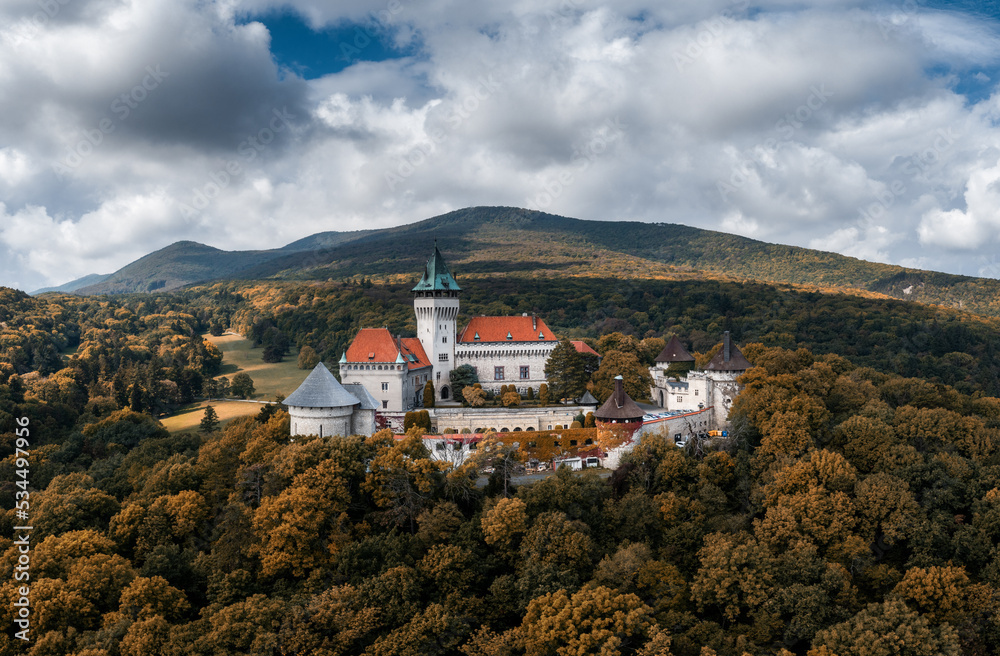 landscape of Smolenice Castle in the Little Carpathians in early autumn with fall foliage colors