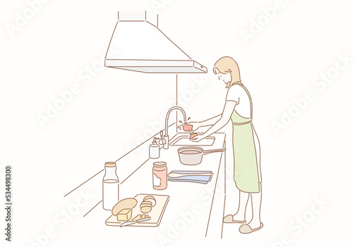 Smiling woman washing tomatoes before cooking. Hand drawn style vector design illustrations.