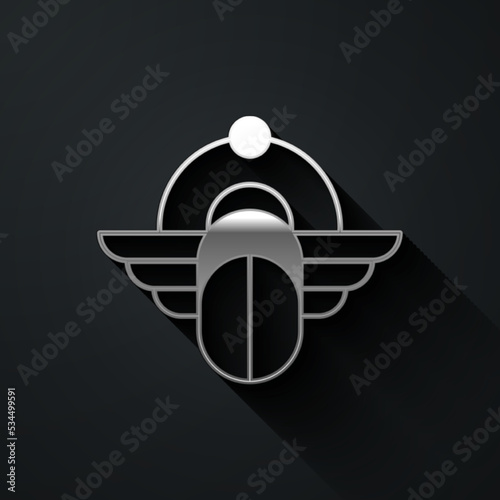 Silver Egyptian Scarab icon isolated on black background. Winged scarab Beetle and sun. Long shadow style. Vector