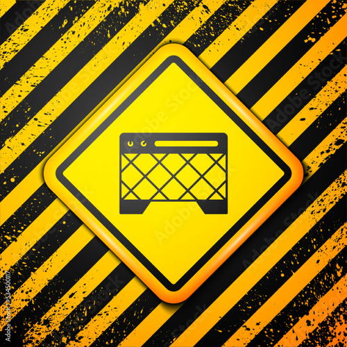Black Guitar amplifier icon isolated on yellow background. Musical instrument. Warning sign. Vector