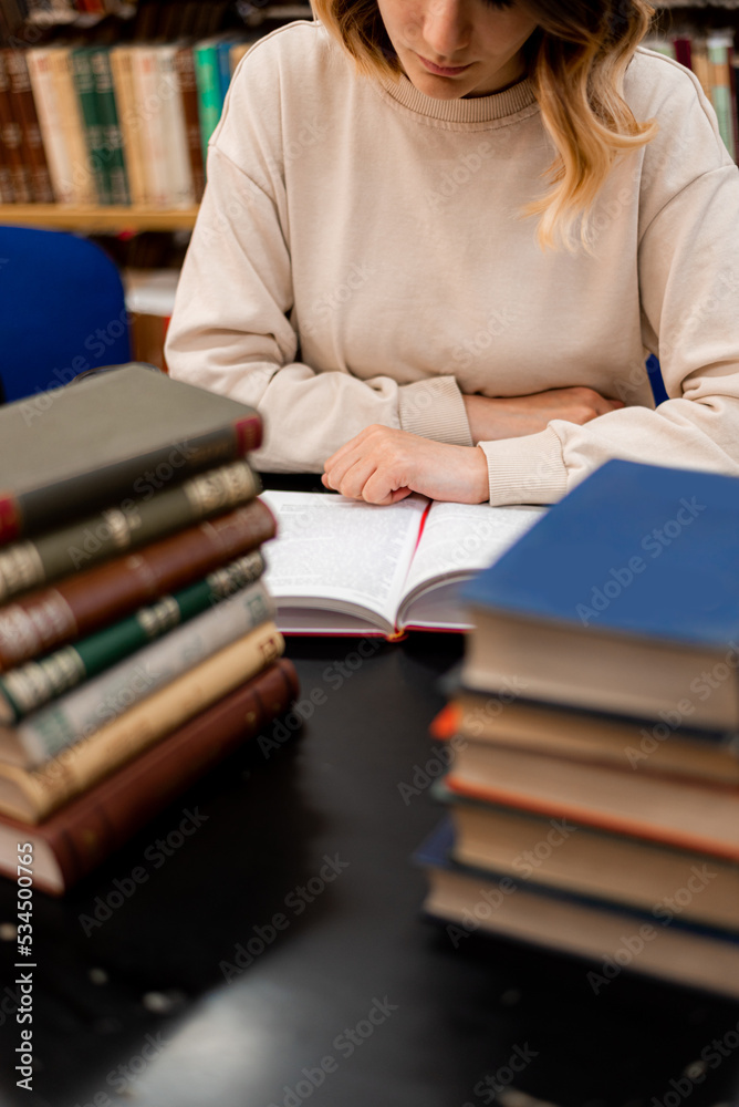 Girl with books reading Girl with books reading