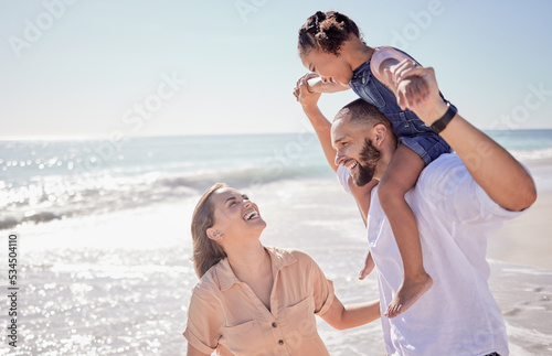 Beach holiday, mother and father with girl bonding in fun game by Costa Rican ocean or sea for summer. Smile, happy and playful man, woman or parents carrying family daughter, kid or child in nature