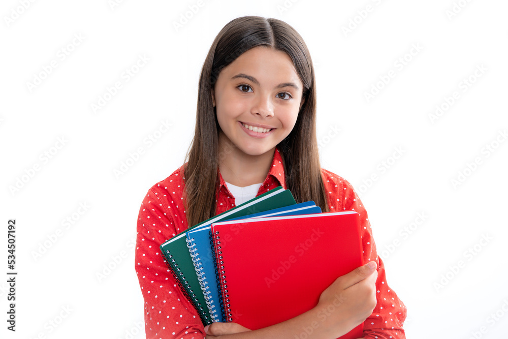 Teenager school girl with books isolated white studio background. Portrait of happy smiling teenage child girl. Teenager school girl with books isolated white studio background. Portrait of happy smiling teenage child girl.