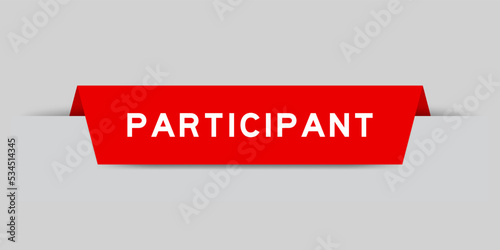 Red color inserted label with word participant on gray background
