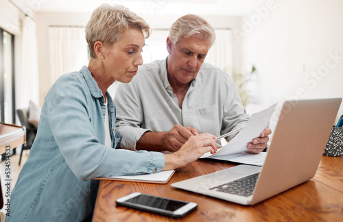 Communication, discussion and couple with paperwork planning financial strategy budget plan. Senior man and woman with documents review finance expenses, retirement plan or mortgage banking payment © Kirsten Davis/peopleimages.com