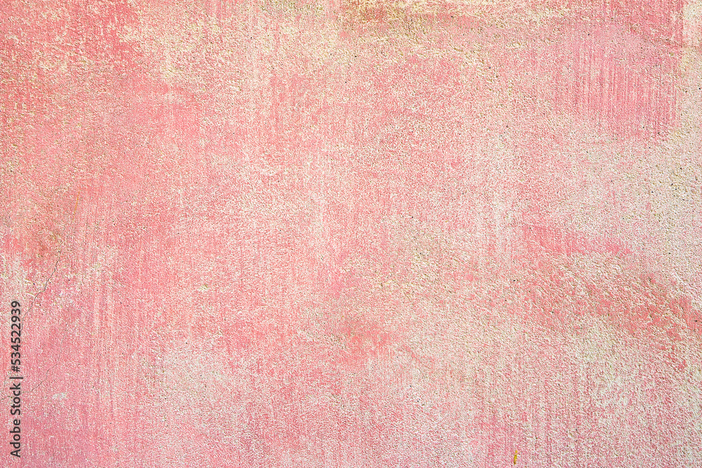 Fototapeta premium Old rough plaster background with red color washed away by the rain