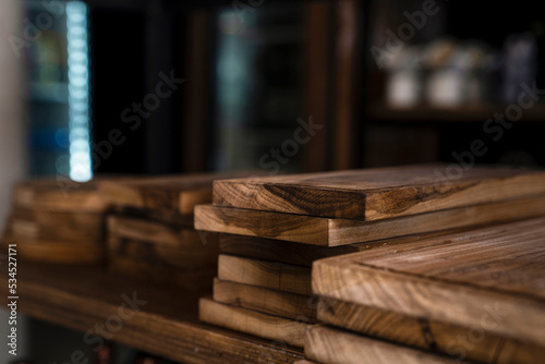 Close-up shot of wooden slabs used for cooking and cutting meat photo