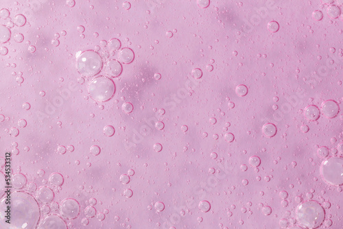 Beautiful Pink textured background with bubbles close up