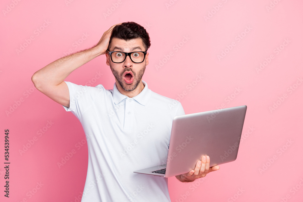 Photo of worried nervous man stupor bug collapse mistake netbook broken bad quality empty space isolated on pink color background Photo of worried nervous man stupor bug collapse mistake netbook broken bad quality empty space isolated on pink color background