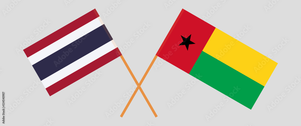 Crossed flags of Thailand and Guinea-Bissau. Official colors. Correct proportion Crossed flags of Thailand and Guinea-Bissau. Official colors. Correct proportion