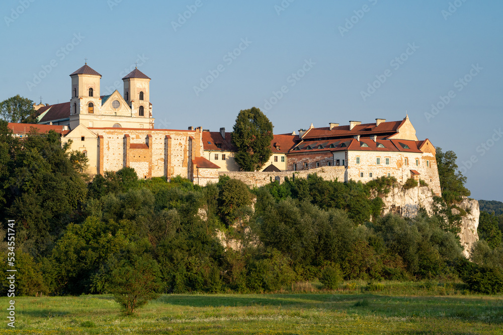 the western frontage of the Benedictine abbey in Tyniec in the evening time