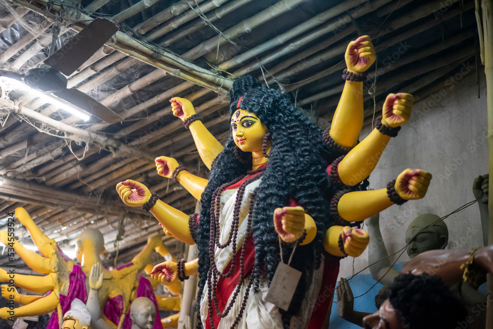 Close-up of Hindu idol goddess Durga ready to go puja mandap