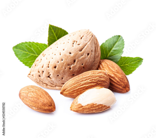 Almonds nuts with leaves on white backgrounds.