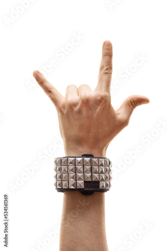 Photography Hand with a bracelet making a rock sign