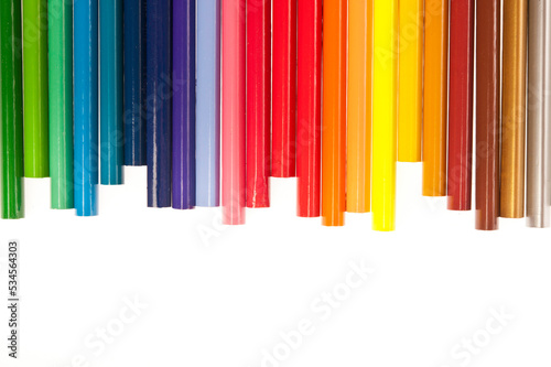 row of coloful pastels or crayons isolated
