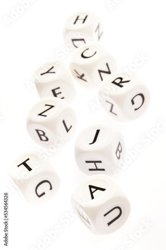 white dice with letters