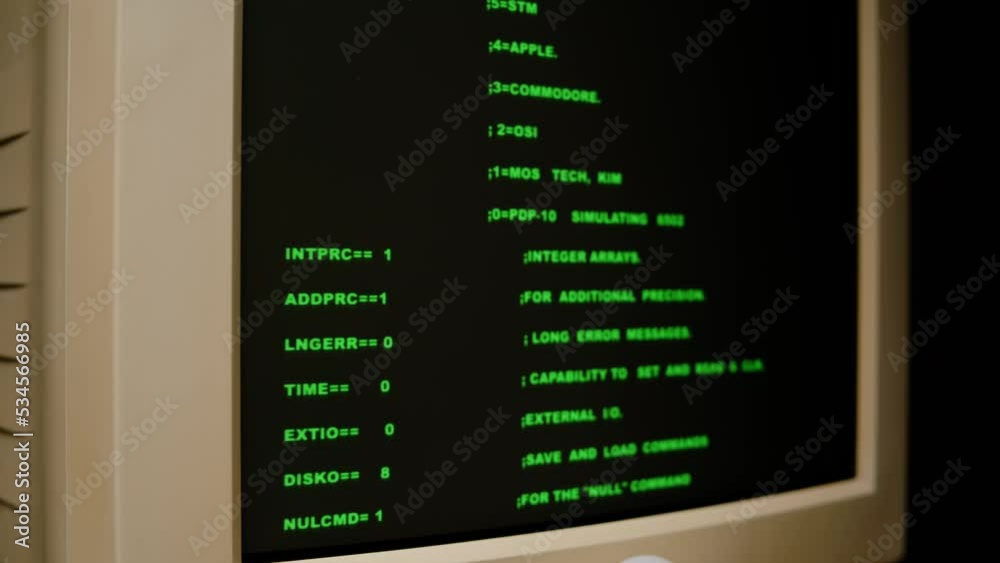 Retro pc with loading code console, programmer making scripts, green basic screen, Old computer studio close-up, Desktop vintage retro wave display, late 90s PC. Retro pc with loading code console, programmer making scripts, green basic screen, Old computer studio close-up, Desktop vintage retro wave display, late 90s PC.