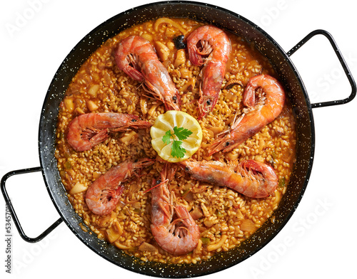 Fotografie Seafood paella in the pan with prawns