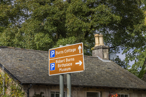 Fényképezés Road sign for Brig O Doon and the Robert Burns Monument and Musemn, Alloway, Ayr, Ayrshire