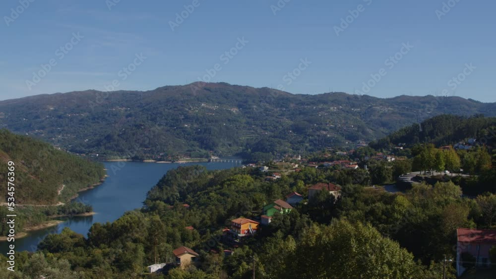 Beautiful panoramic view on highland river and villages scattered on mountains, amazing nature of Portugal, Europe. Beautiful panoramic view on highland river and villages scattered on mountains, amazing nature of Portugal, Europe.