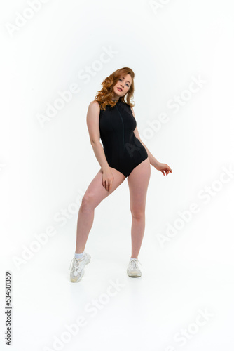 model size posing bodysuit on white background