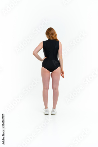 model size posing bodysuit on white background