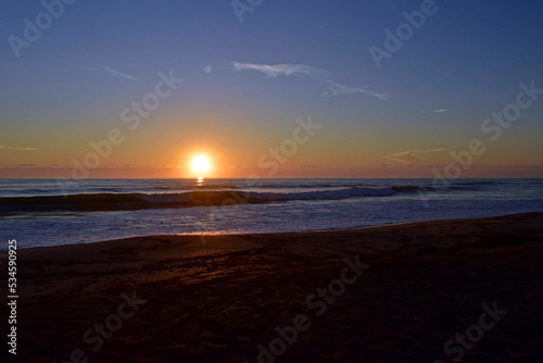 Glowing sunrise over the Atlantic Ocean © LilliDale