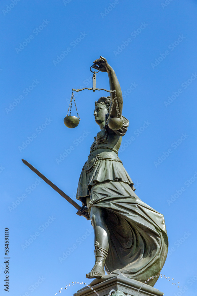 Lady Justice fountain at the Romerberg in Frankfurt Lady Justice fountain at the Romerberg in Frankfurt