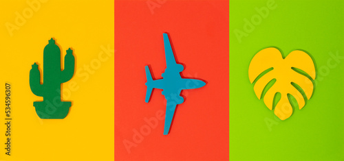 poster design symbols related to travel, adventure and vacation. colored background 