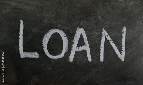 Loan Word with Written on Blackboard with White Chalk in Horizontal Orientation, Business and Financial Conceptual