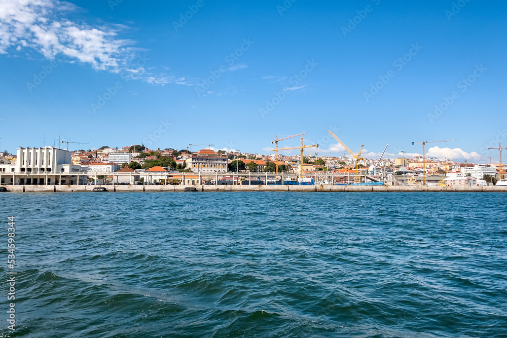 View from a tour boat passing by the Port of Lisbon