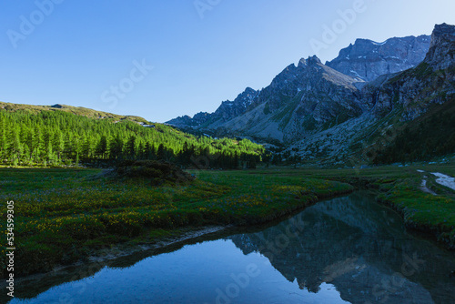 Fototapeta Naklejka Na Ścianę i Meble -  The mountains of the natural park alpe veglia - alpe devero during a sunny day, near the town of Baceno, Italy - July 2022.