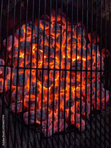 Red Hot Charcoal Coals burning with flames inside Grill