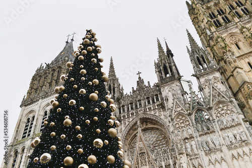 Decorated Christmas tree and cathedral in Rouen photo