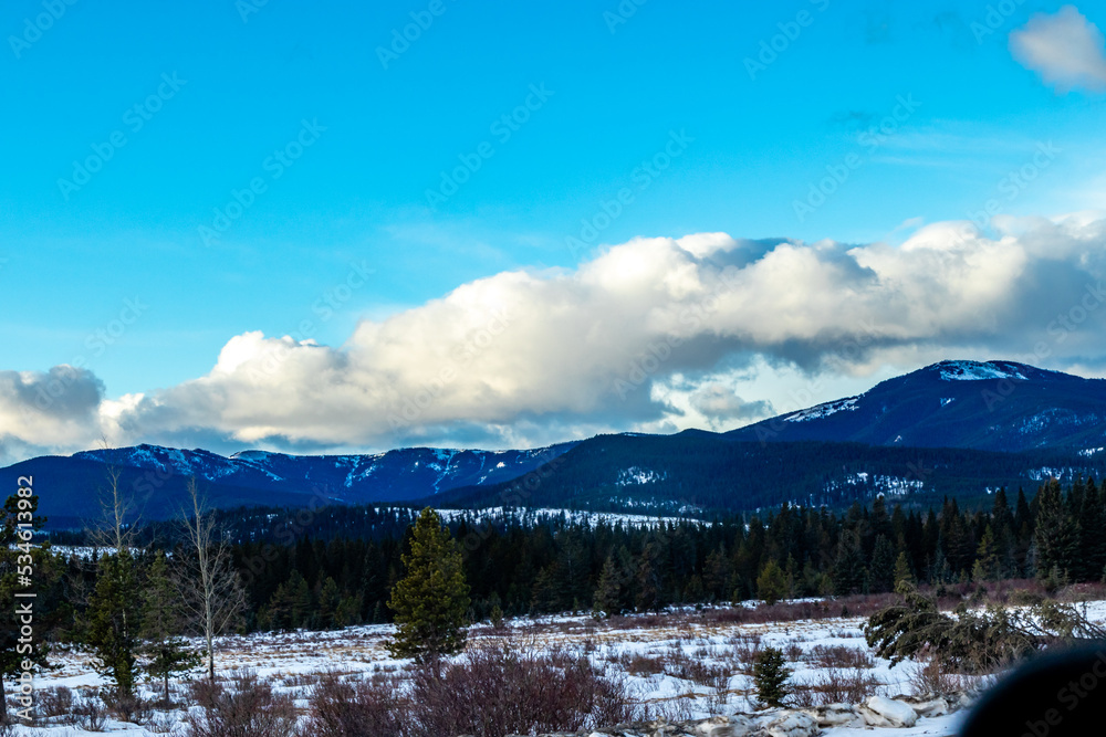 Clouds hang over the foothills. Sibbald Creek Trail, Alberta, Canada Clouds hang over the foothills. Sibbald Creek Trail, Alberta, Canada