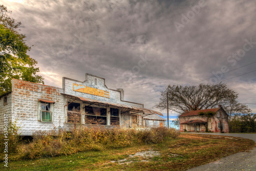 Abandoned Store In Friedheim Missouri Broken glass invite the wind to bring in the rain.